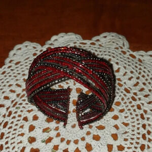 Beautiful beaded Red bracelet with a pretzel look